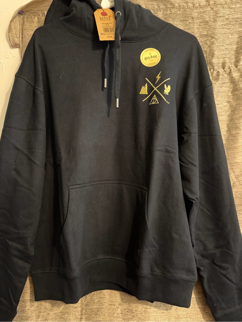 NWT. Warner Bros. Black Harry Potter Crest Pullover Hoodie